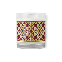 A sleek glass jar soy candle with a country farmhouse barn quilted pattern design of Autumn Season color scheme. 