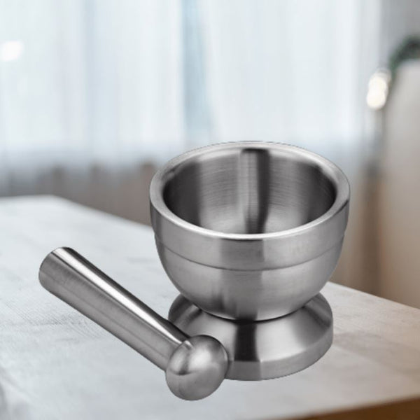 Elegant stainless steel mortar and pestle in brushed finish. Perfect tool for your kitchen to grind your spices, herbs, garlic, ginger and more when preparing your delicious homecooked dinner. Ergonomic, easy to clean and durable.